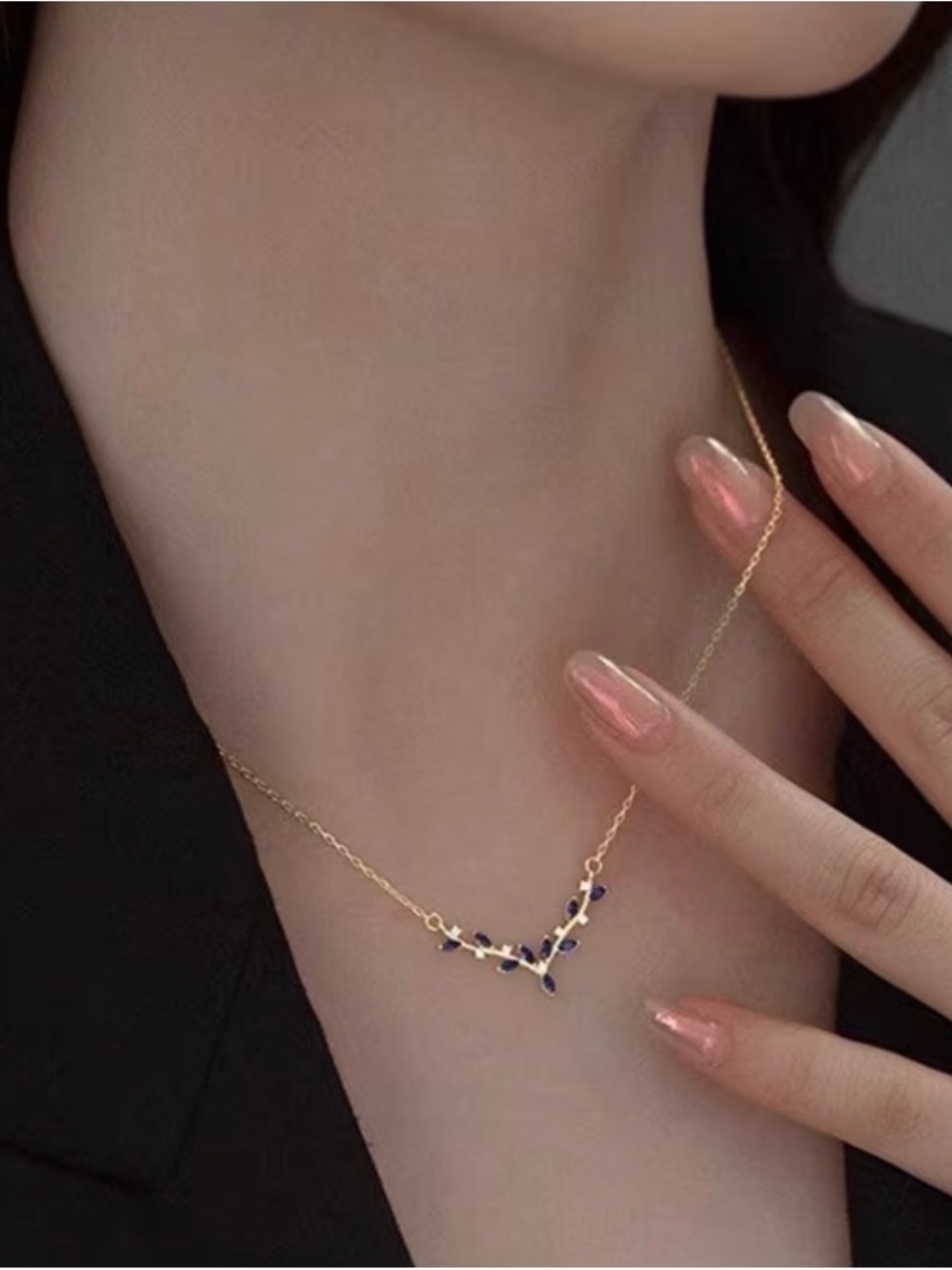 Elegant Gold V-Leaf Necklace with Blue Accents